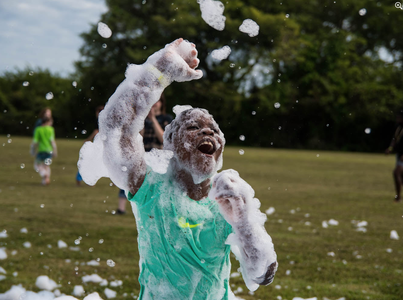 Boy playing in foam - Foam Dawgs foam party rentals Northwest Georgia