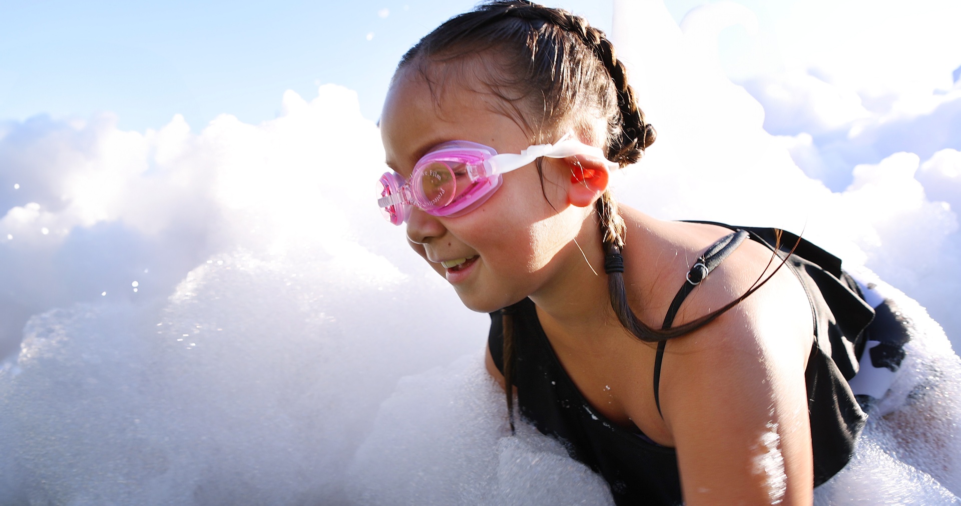 Girl smiling in foam - Foam Dawgs foam party rentals Northwest Georgia
