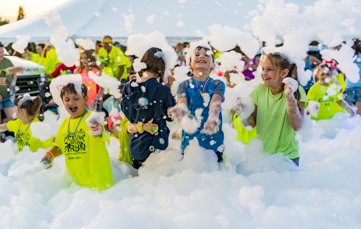 Kids running through foam - Foam Dawgs foam party rentals Northwest Georgia